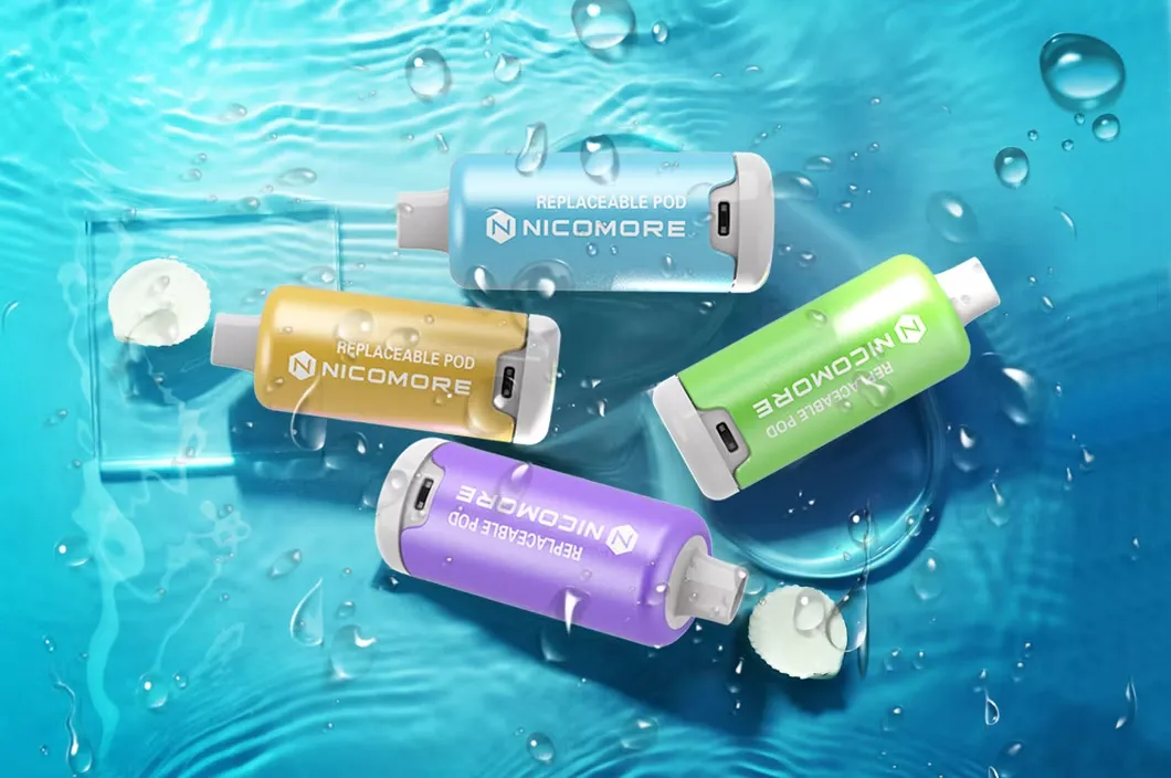 Nicomore replaceable pods in multiple colors including yellow, green, blue, and purple, floating on a water surface.